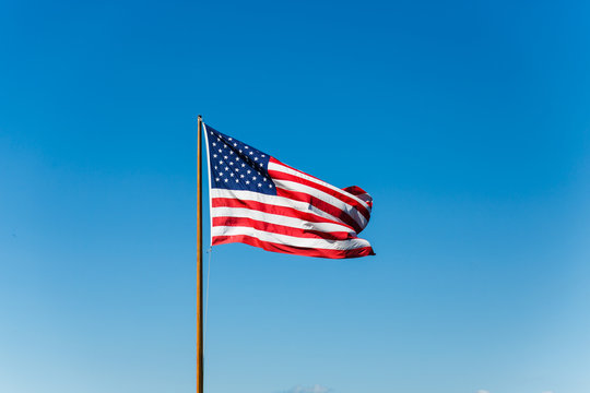 American Flag On Old Flagpole