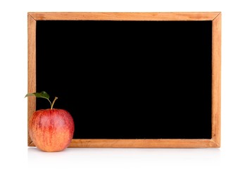 Red apple with blank black blackboard with text space