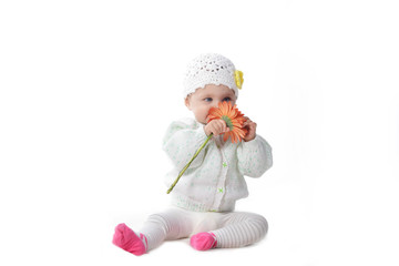 baby girl  with red flower
