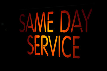 Fototapeta na wymiar Neon Sign Same Day Service