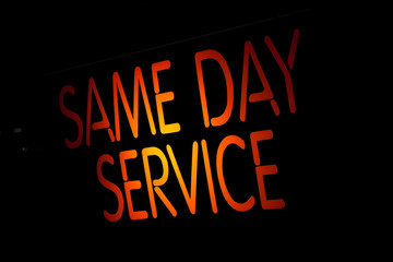 Fototapeta na wymiar Neon Sign Same Day Service