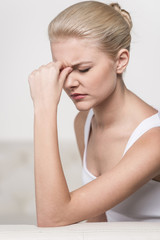 Fototapeta premium Close up portrait of woman feeling headache.