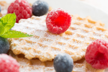 sweet Belgian waffles with fresh berries, selective focus