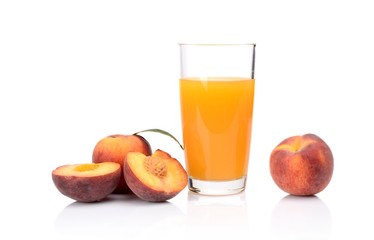 Close-up shot sliced orange peaches with juice and leaf