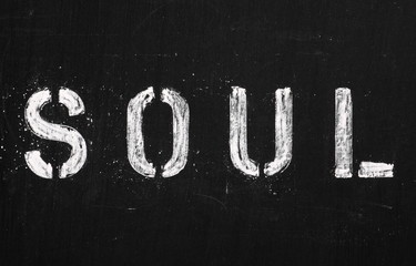 The word Soul in stencil letters on a blackboard