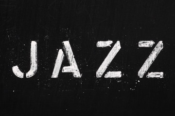 The word Jazz in stencil letters on a blackboard
