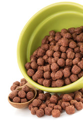 cereal chocolate balls in bowl on white