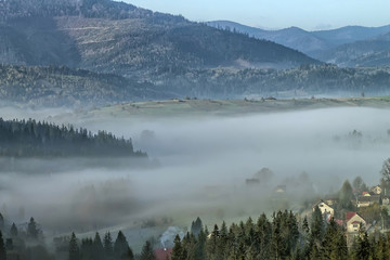 Fog in the mountains at sunrise