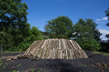fresh made charcoal kiln in german forest