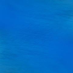 Deep blue surface of the water background