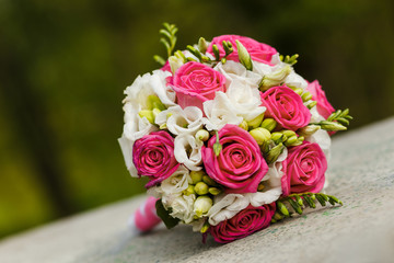 Wedding bouquet of red white roses