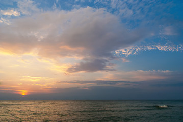 Beautiful seascape with orange warm sunrise