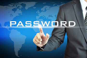 Businessman hand touching PASSWORD sign on virtual screen