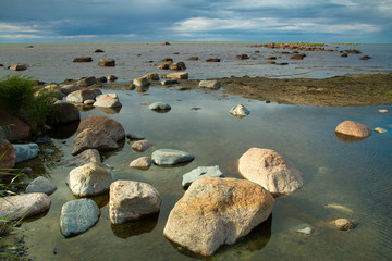 rocks into the sea