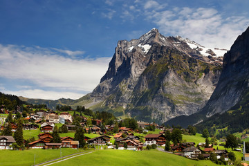 Grindelwald Village in Berner Oberland, Switzerland - obrazy, fototapety, plakaty