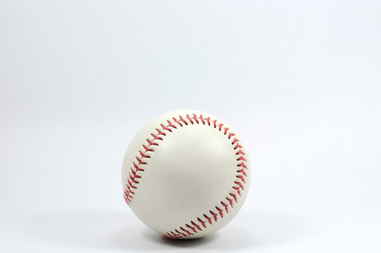 Single baseball on white background.