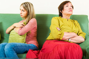 Offended  mother and daughter after a quarrel
