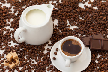 Black coffee with milk and sugar