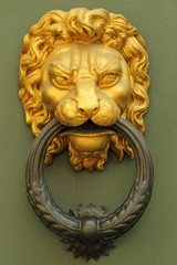 old fashion golden lion's head knocker