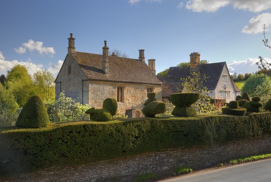 Cotswold House With Topiary Hedge