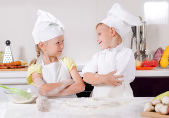 Supercilious little boy chef