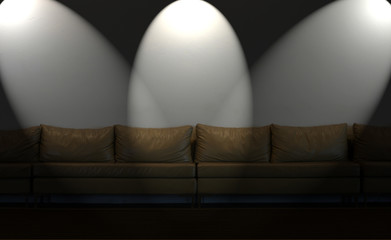couch on white wall with lights