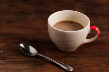 coffee cups on wood background.