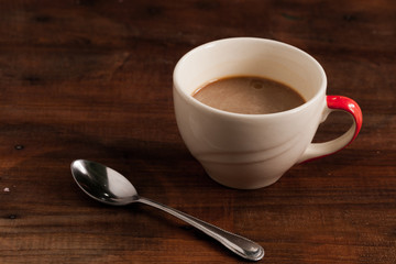 coffee cups on wood background.