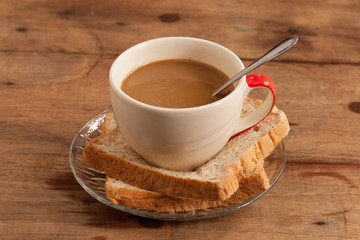 cup of coffee and Whole Wheat Bread.