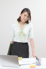 机に足をのせて書類を見る女性 Wall Mural Wallpaper Murals Stockfoto 机に足をのせて書類を見る女性 Wall Mural Wallpaper Murals Stockfoto