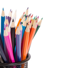 Drawing supplies: assorted color pencils, isolated on white back