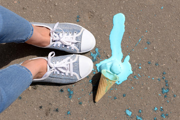 Ice cream fell on asphalt top view - obrazy, fototapety, plakaty