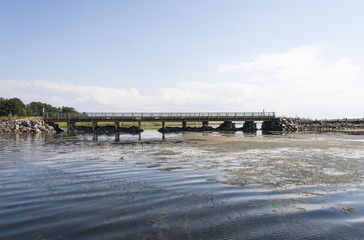 Fototapeta na wymiar Wood bridge over the water