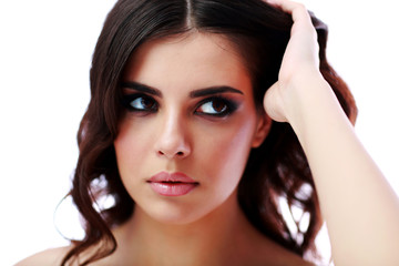 Fototapeta premium Closeup portrait of a beautiful woman looking away