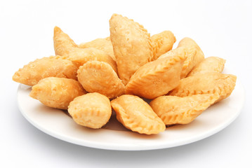 sweet fried dumpling for Chinese New Year on white