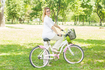 Happy Woman with the Bike