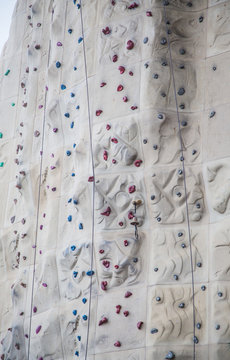 Foor and Hand Holds on Rock Climbing Wall