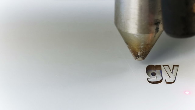 Laser cnc machine cutting technology word on acryl plate