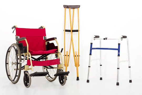 Wheelchair,crutches And Mobility Aids. Isolated On White