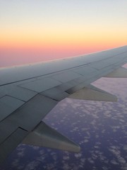 Fototapeta na wymiar puesta de sol desde el avion