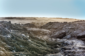 coast with Stones of volcanic flow