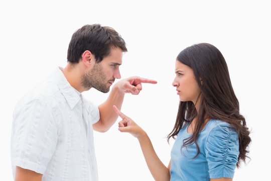 Angry Couple Pointing At Each Other