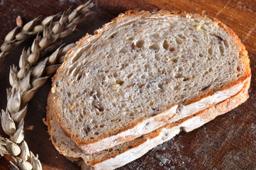 sliced wholemeal bread on brown wood