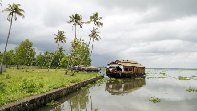 houseboat in backwaters on a clody day