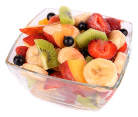 Fresh fruits salad in bowl isolated on white