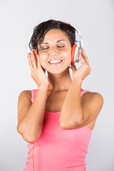 Young Woman Listening Music with Headphones