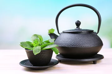 Foto op Aluminium Chinese traditional teapot with fresh mint leaves © Africa Studio
