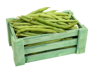 French beans in wooden box isolated on white