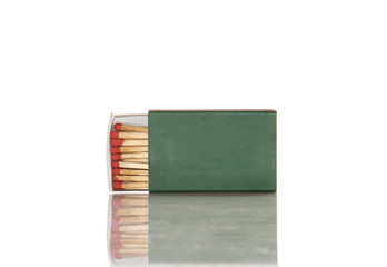 Safety matches in green box.