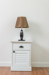 Lamp on bedside table